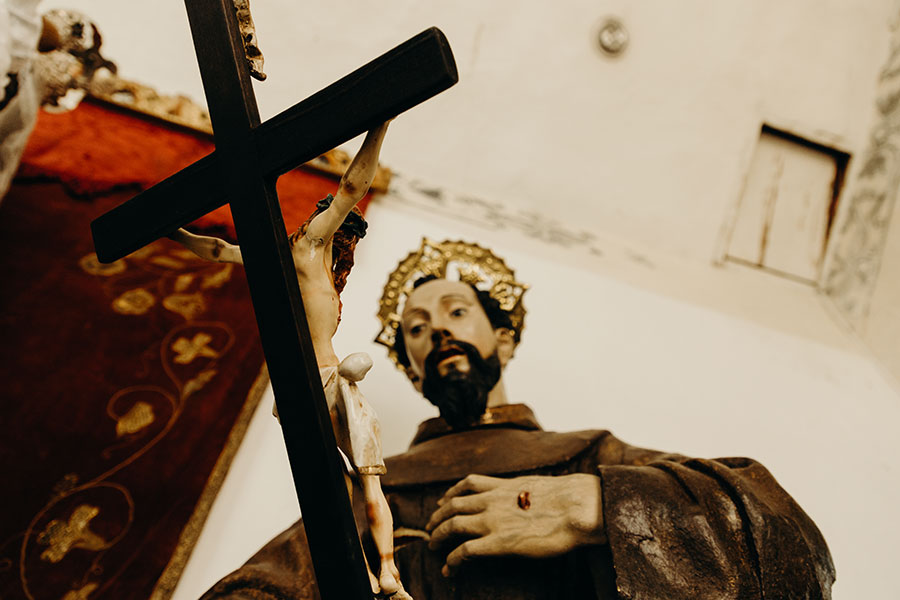 St. Francis of Assisi statue and crucifix